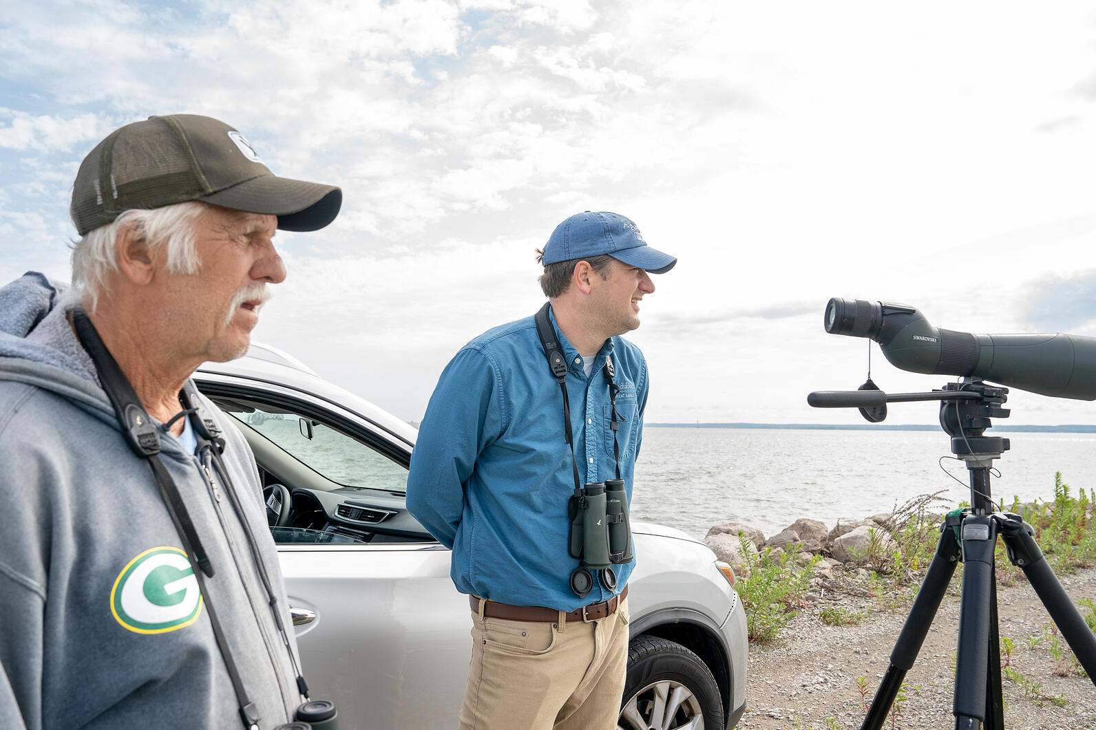 Tom Prestby, Conservation Manager at Audubon Great Lakes and Volunteer Bird Monitor watch over Great Lakes Piping Plovers. Monitors and volunteers at nesting sites spend hours each day checking on the birds, educating beachgoers, and protecting plovers fr