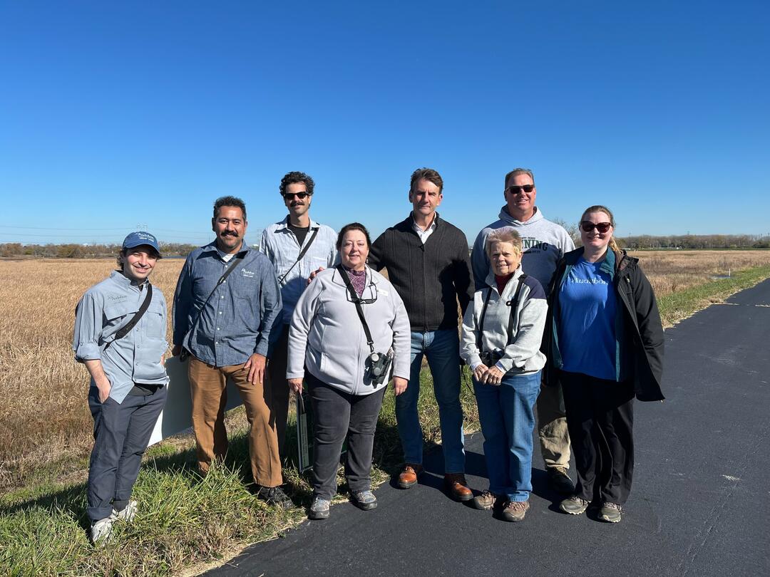 Rep. Mrvan, The Wetlands Initiative, and Audubon staff and members smiling at the camera